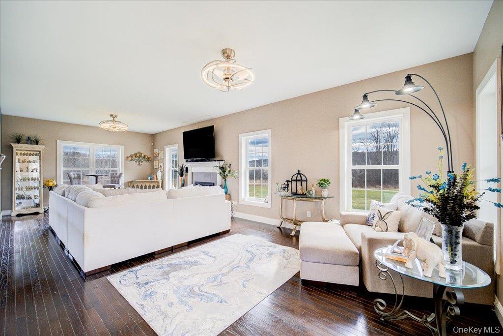 77 Houston Road Goshen, NY 10924 - Photo 6 of 46 a living room with furniture and a flat screen tv
