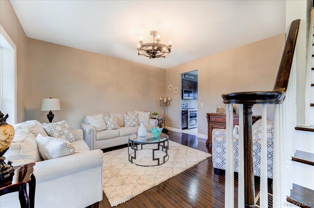 77 Houston Road Goshen, NY 10924 - Photo 10 of 46 a living room with furniture and wooden floor