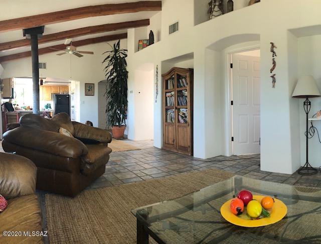 14565 West Hardscrabble Road, Unit W Arivaca, AZ 85601 - Photo 3 of 14 a living room with furniture and a rug