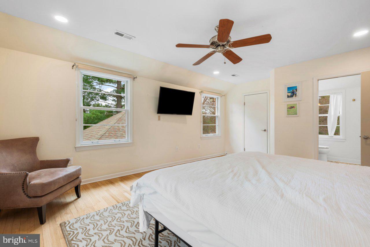 1803 Thornton Ridge Road Baltimore, MD 21204 - Photo 40 of 81 a bedroom with a bed and a chair