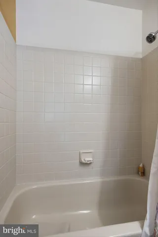 a bathroom with a bathtub