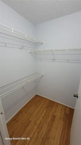 a view of small space with racks on the wall