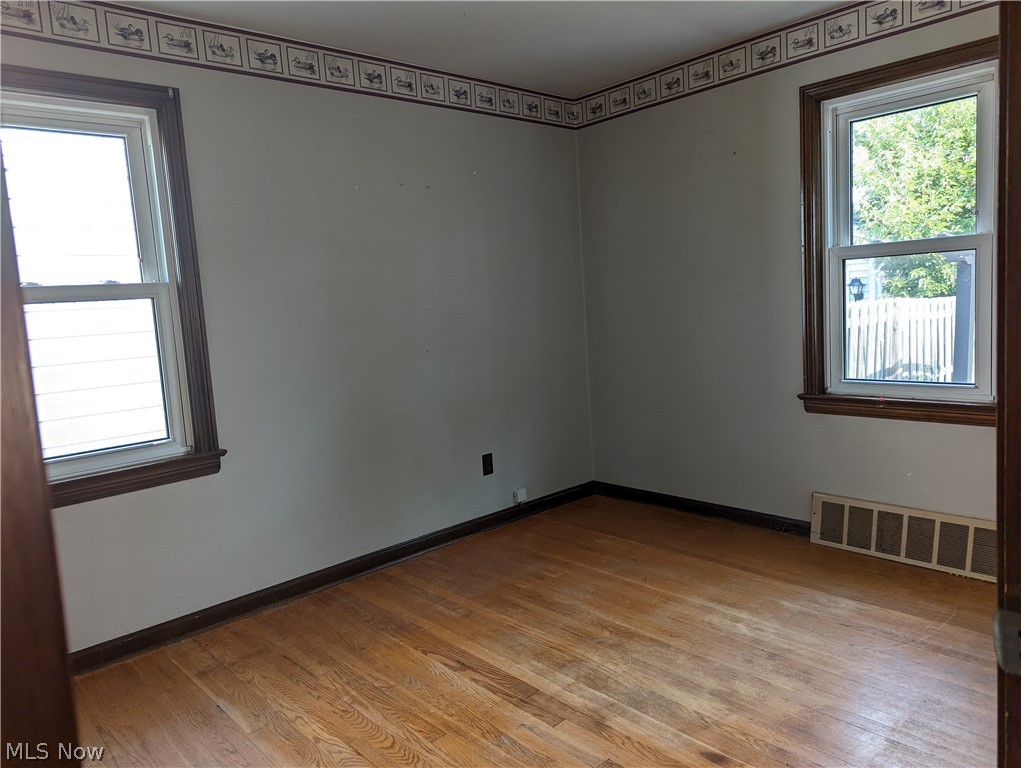 13817 Granger Road Cleveland, OH 44125 - Photo 10 of 22 Second first-floor bedroom.