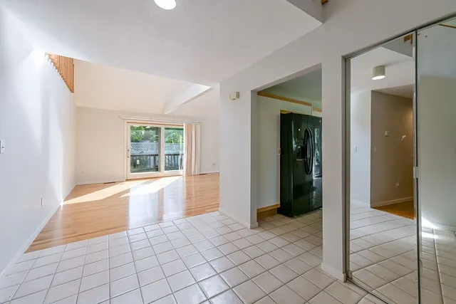 a view of an empty room and window