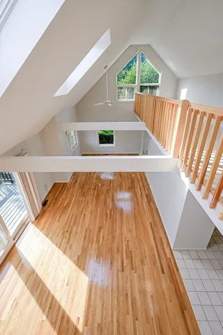 a view of wooden floor and staircase