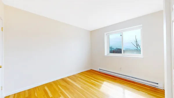 a view of a room with a window