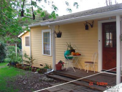 7800 Occidental Road Sebastopol, CA 95472 - Photo 1 of 1 a front view of a house with a yard