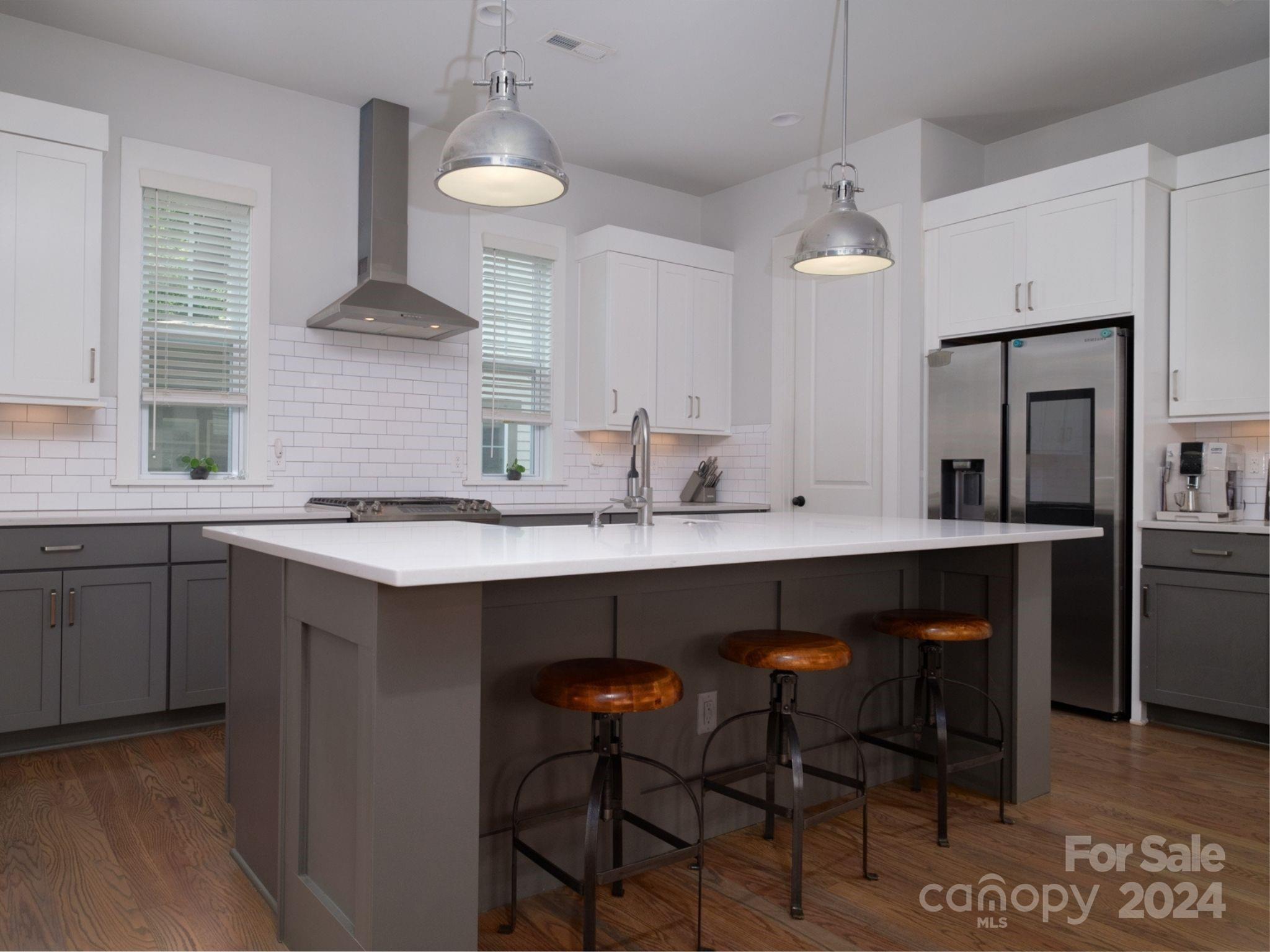 1410 Briar Creek Road Charlotte, NC 28205 - Photo 14 of 42 a kitchen with a sink cabinets and window