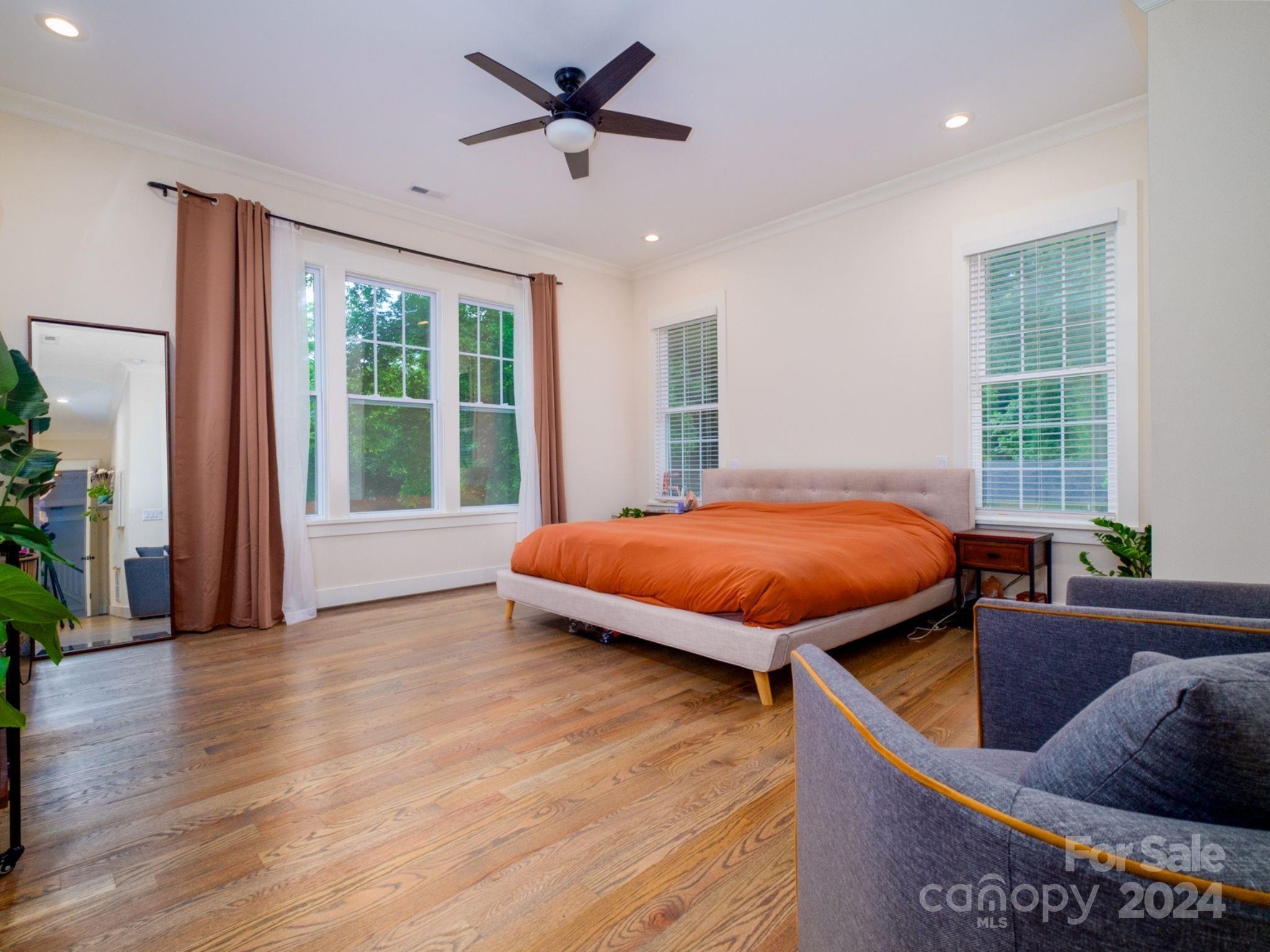 1410 Briar Creek Road Charlotte, NC 28205 - Photo 23 of 42 a bed room with a bed and a window