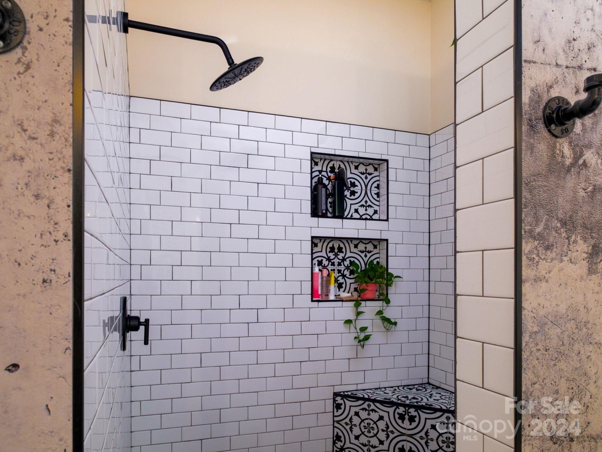 1410 Briar Creek Road Charlotte, NC 28205 - Photo 30 of 42 a bathroom with a shower