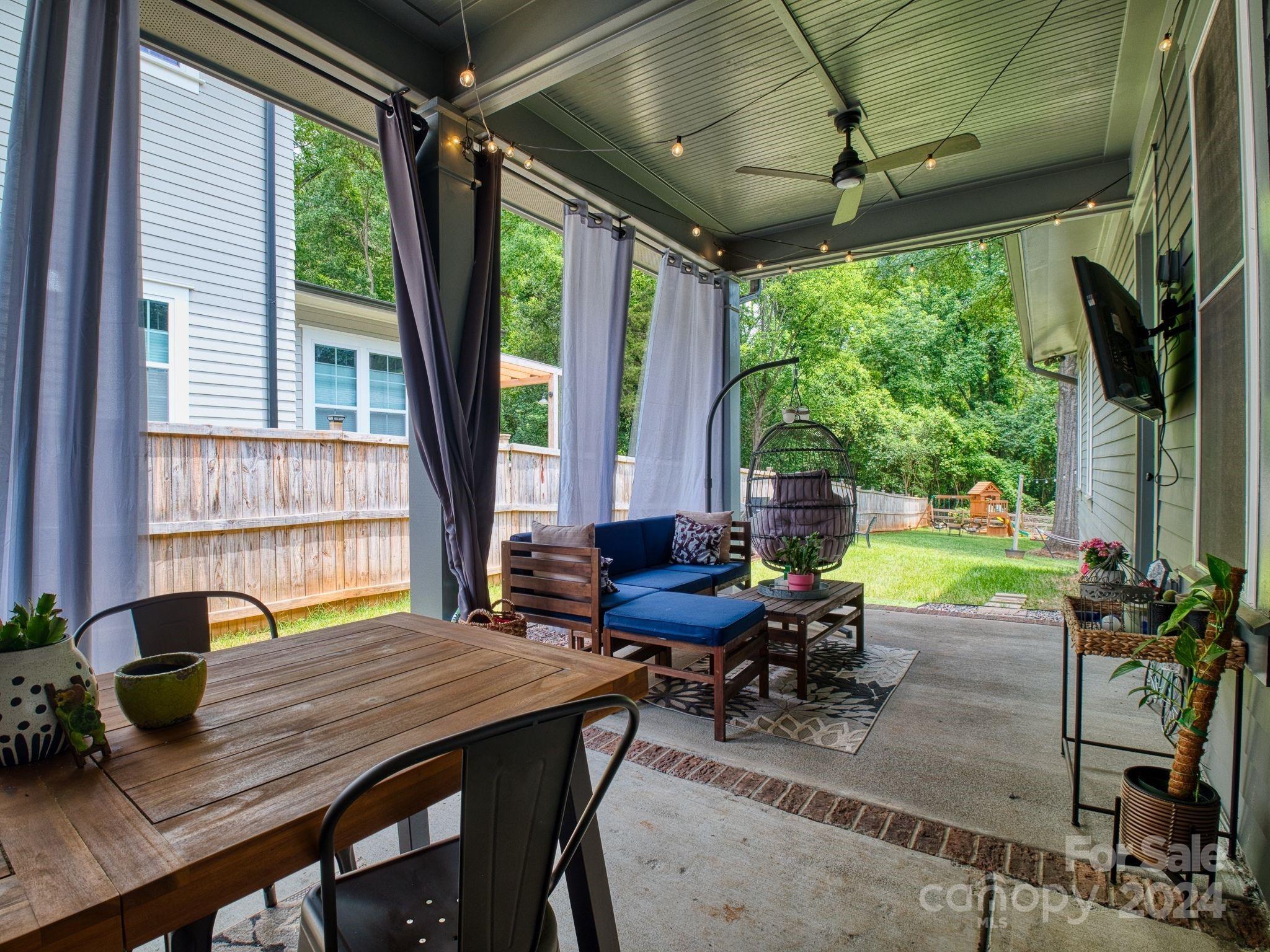 1410 Briar Creek Road Charlotte, NC 28205 - Photo 8 of 42 a view of a dining room with furniture window and outside view