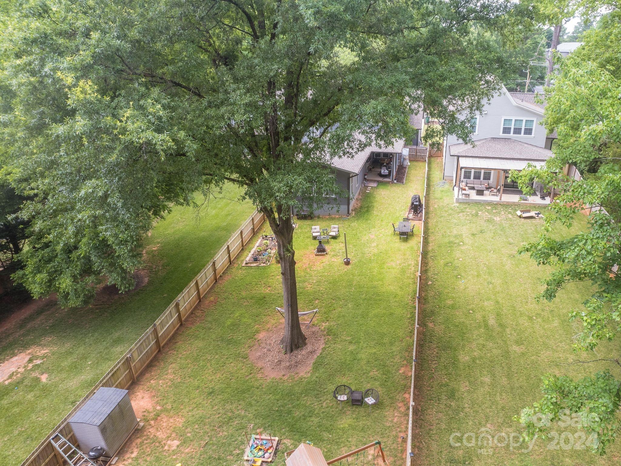 1410 Briar Creek Road Charlotte, NC 28205 - Photo 9 of 42 a view of a lake from a balcony