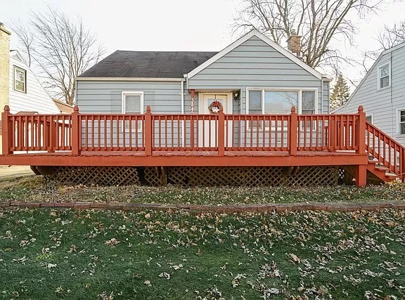 front view of a house with a deck