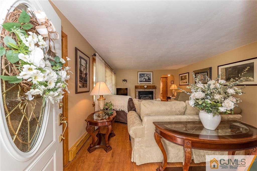 144 Upper Ferry Road Ewing, NJ 08628 - Photo 2 of 25 a view of a dining room with furniture and a potted plant