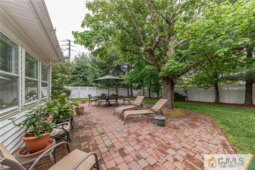 144 Upper Ferry Road Ewing, NJ 08628 - Photo 22 of 25 a view of a backyard with sitting area