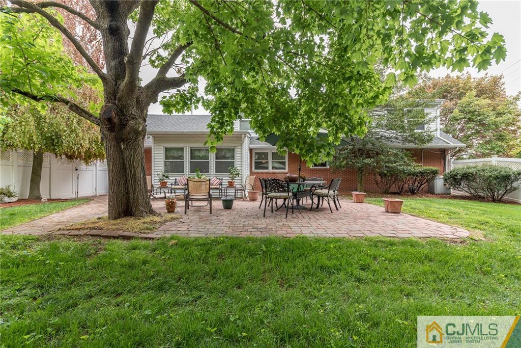 144 Upper Ferry Road Ewing, NJ 08628 - Photo 24 of 25 a house view with a sitting space and garden