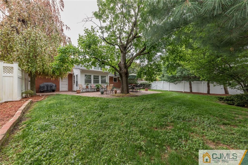 144 Upper Ferry Road Ewing, NJ 08628 - Photo 25 of 25 a view of a house with backyard and a tree