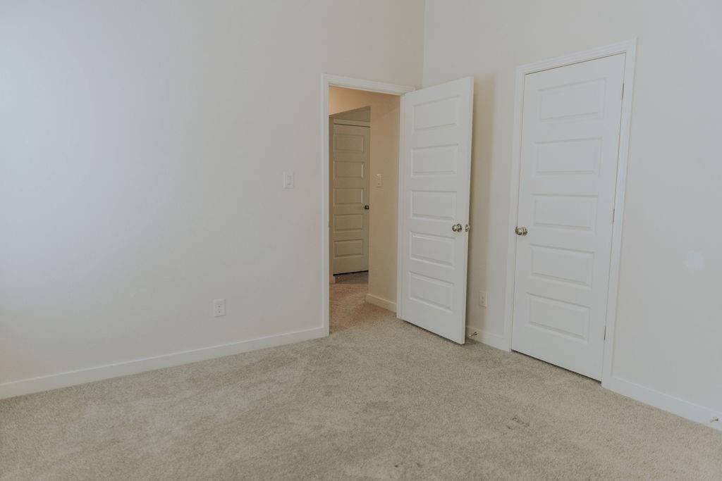989 Sprangletop Street Allen, TX 75013 - Photo 18 of 20 an empty room with closet area