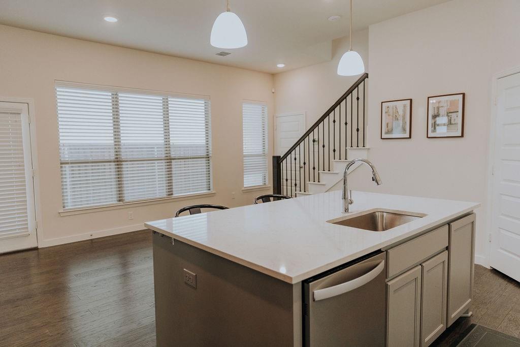989 Sprangletop Street Allen, TX 75013 - Photo 5 of 20 a kitchen with a sink and a window