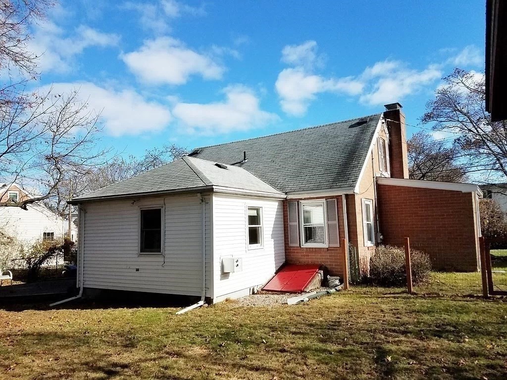 126 Russell Road Newton, MA 02465 - Photo 15 of 27 a view of a house with backyard