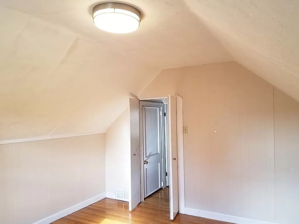 126 Russell Road Newton, MA 02465 - Photo 22 of 27 a view of a livingroom with wooden floor