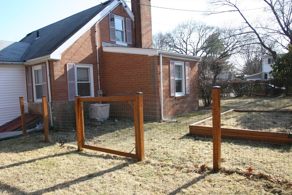126 Russell Road Newton, MA 02465 - Photo 26 of 27 a view of a house with backyard