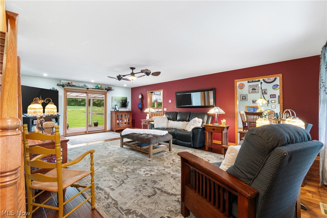 5212 Gray Road Ravenna, OH 44266 - Photo 2 of 37 Living room featuring ceiling fan and wood-flooring