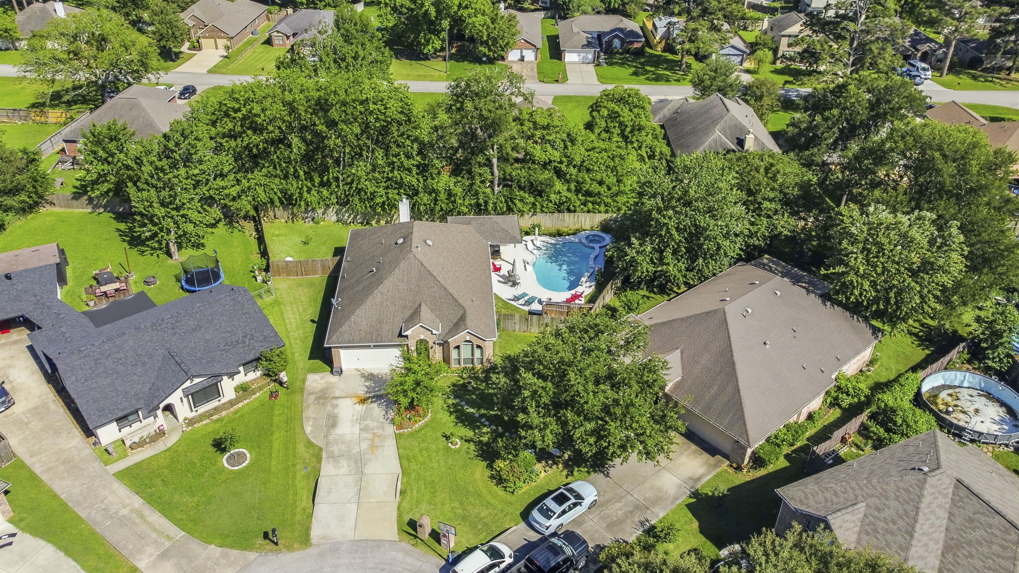 10802 Windswept Montgomery, TX 77356 - Photo 12 of 42 an aerial view of a house with outdoor space and garden