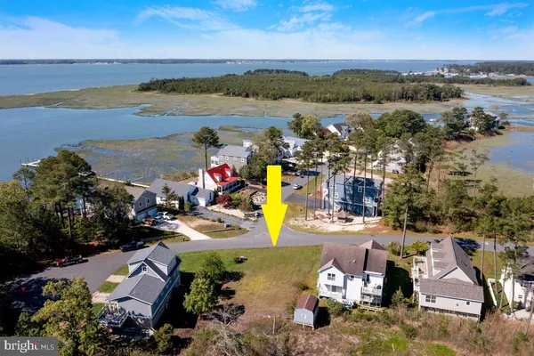 an aerial view of a houses with outdoor space