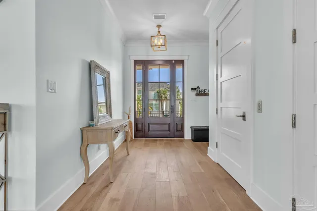 a bathroom with a bathtub sink and mirror