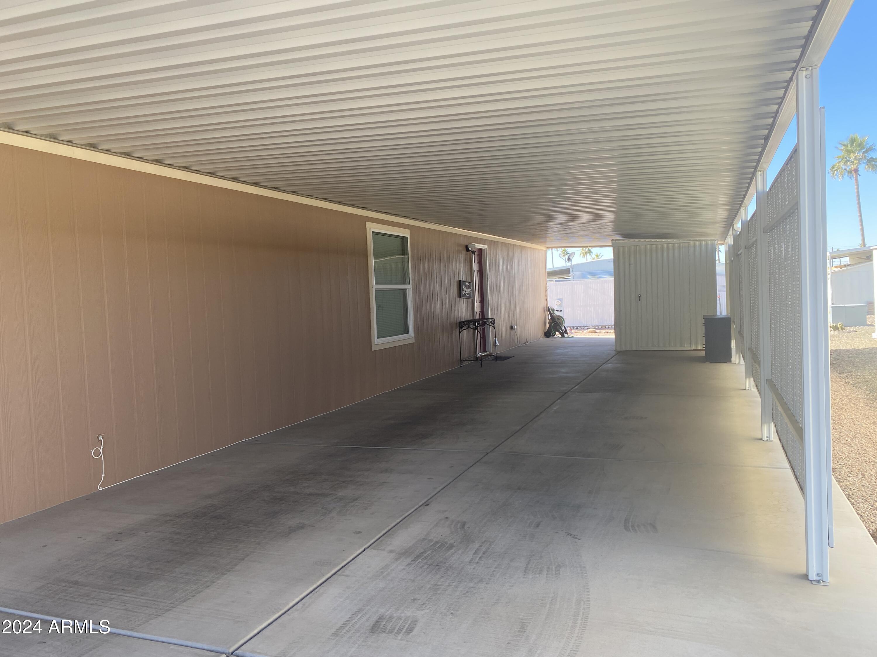 2605 South Tomahawk Road, Unit 86 Apache Junction, AZ 85119 - Photo 15 of 36 Carport