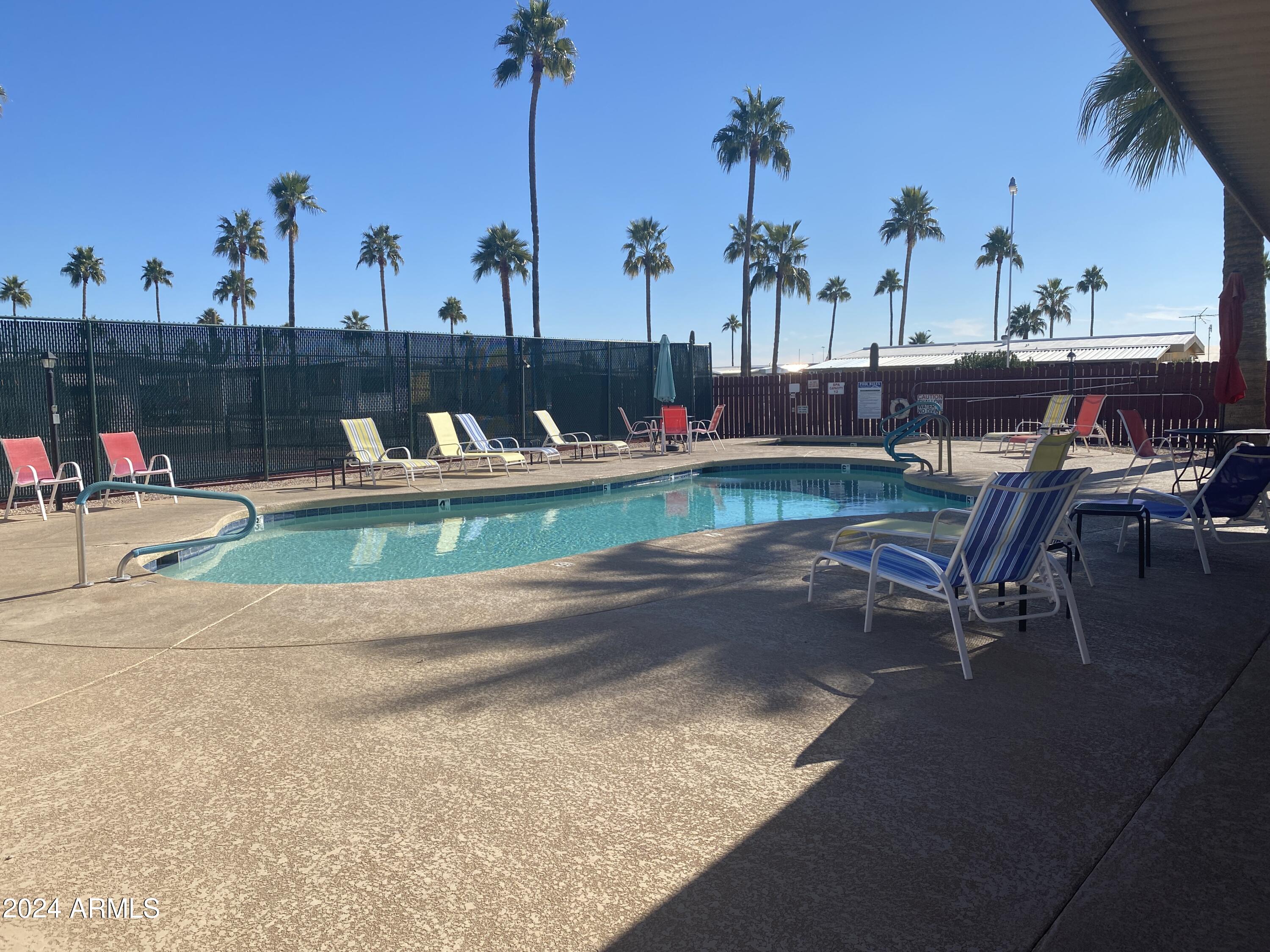 2605 South Tomahawk Road, Unit 86 Apache Junction, AZ 85119 - Photo 31 of 36 Heated Pool