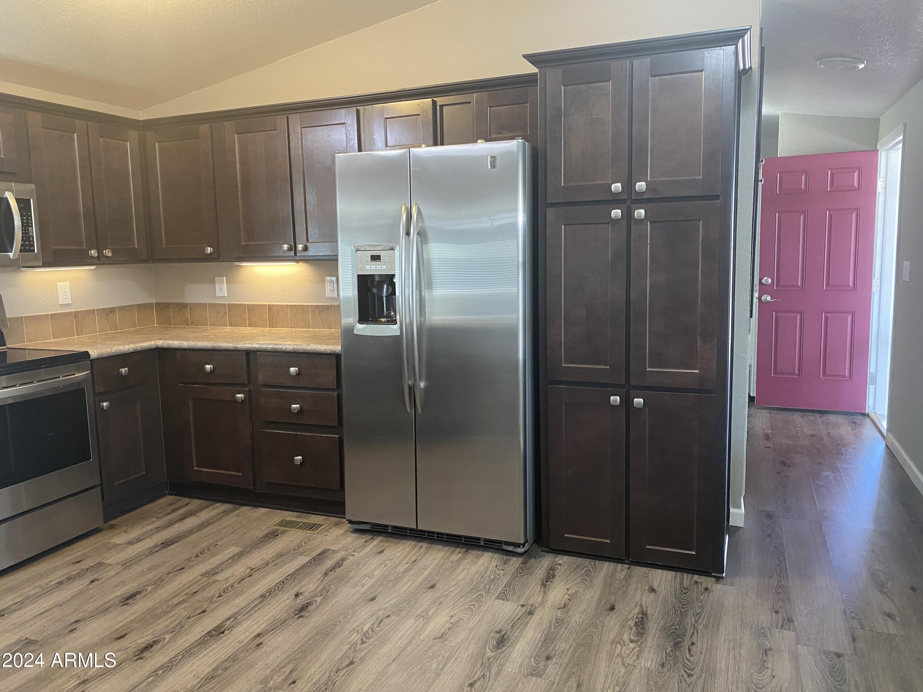 2605 South Tomahawk Road, Unit 86 Apache Junction, AZ 85119 - Photo 7 of 36 Kitchen-Side Door Entrance