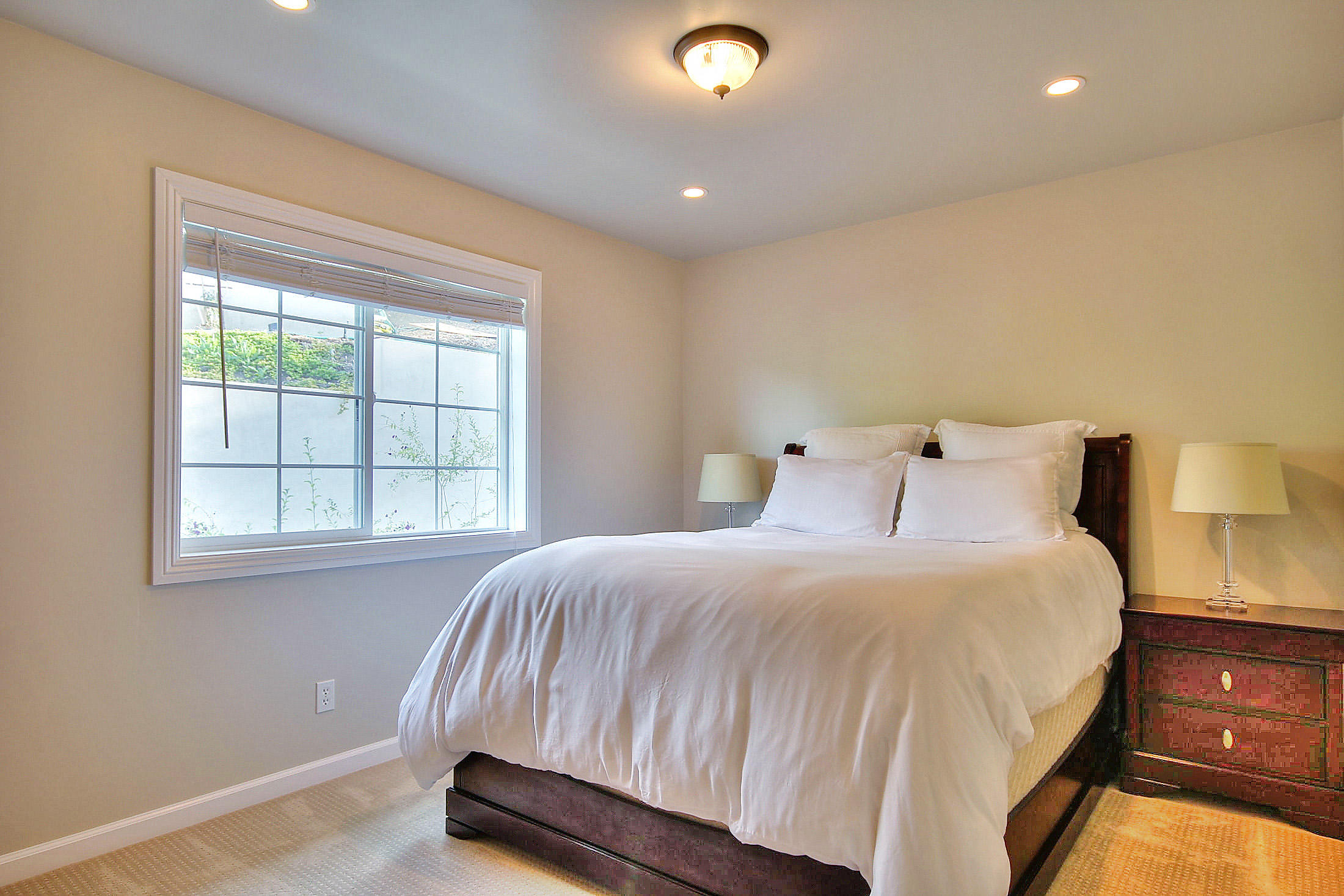 305 Sherman Road Santa Barbara, CA 93103 - Photo 11 of 23 a bedroom with a bed and a window