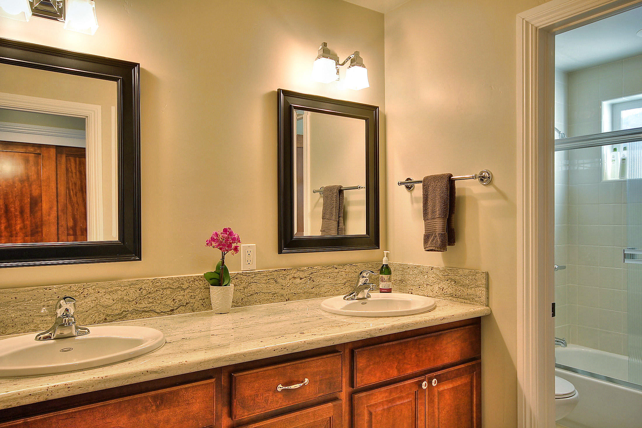 305 Sherman Road Santa Barbara, CA 93103 - Photo 12 of 23 a bathroom with a sink and a mirror