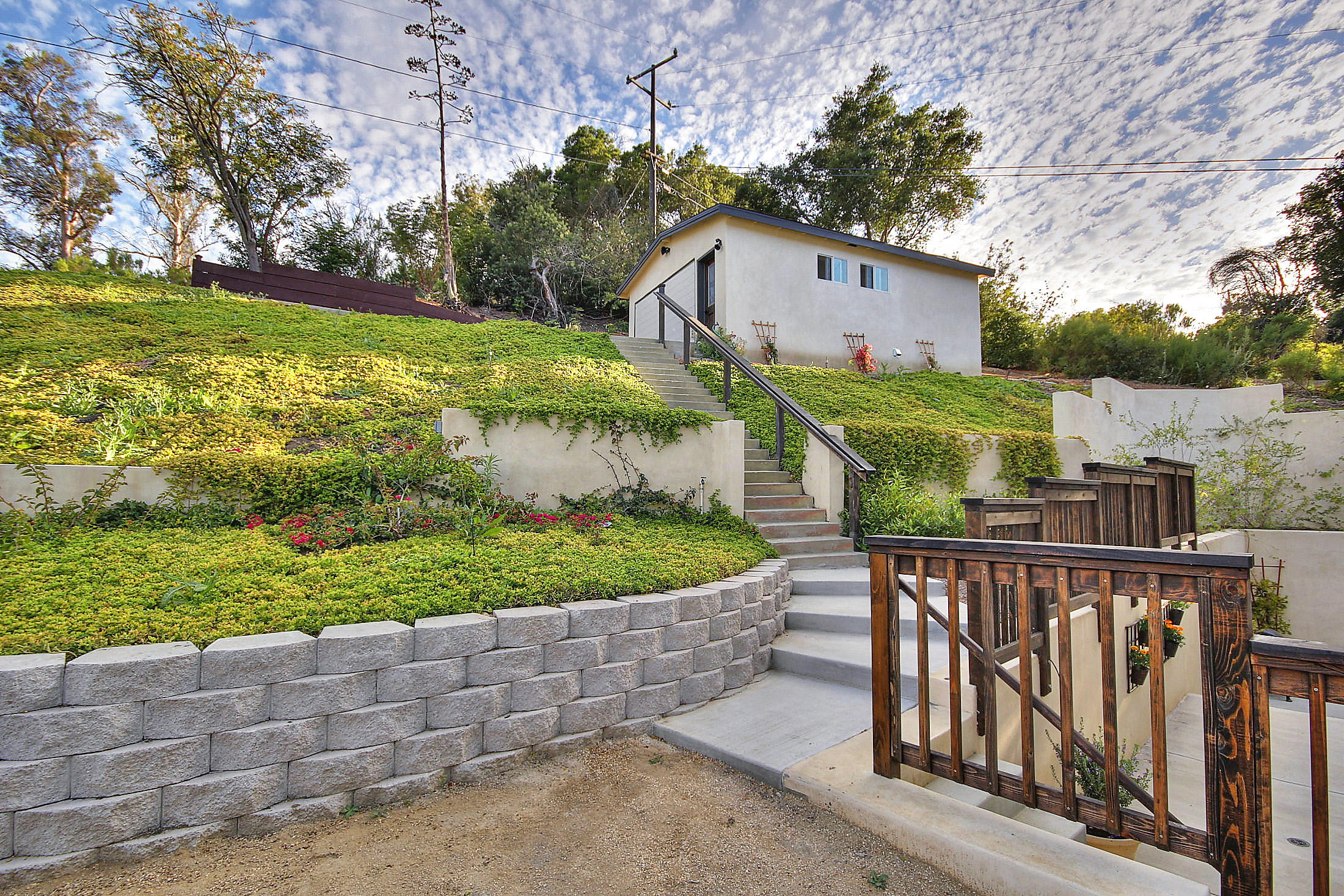 305 Sherman Road Santa Barbara, CA 93103 - Photo 18 of 23 a view of a garden with wooden fence