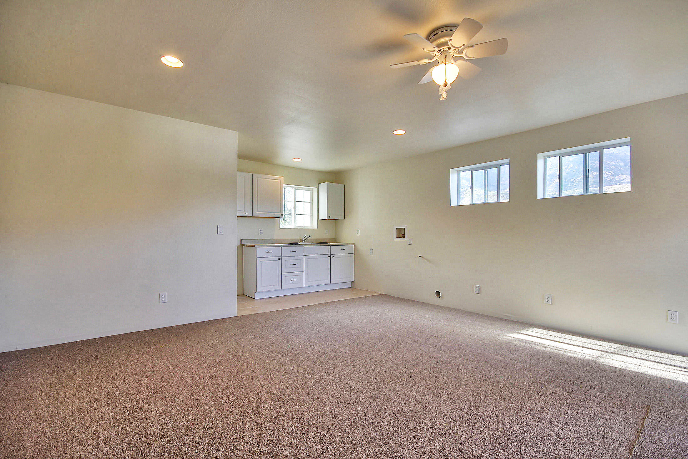 305 Sherman Road Santa Barbara, CA 93103 - Photo 19 of 23 an empty room with a window and a ceiling fan