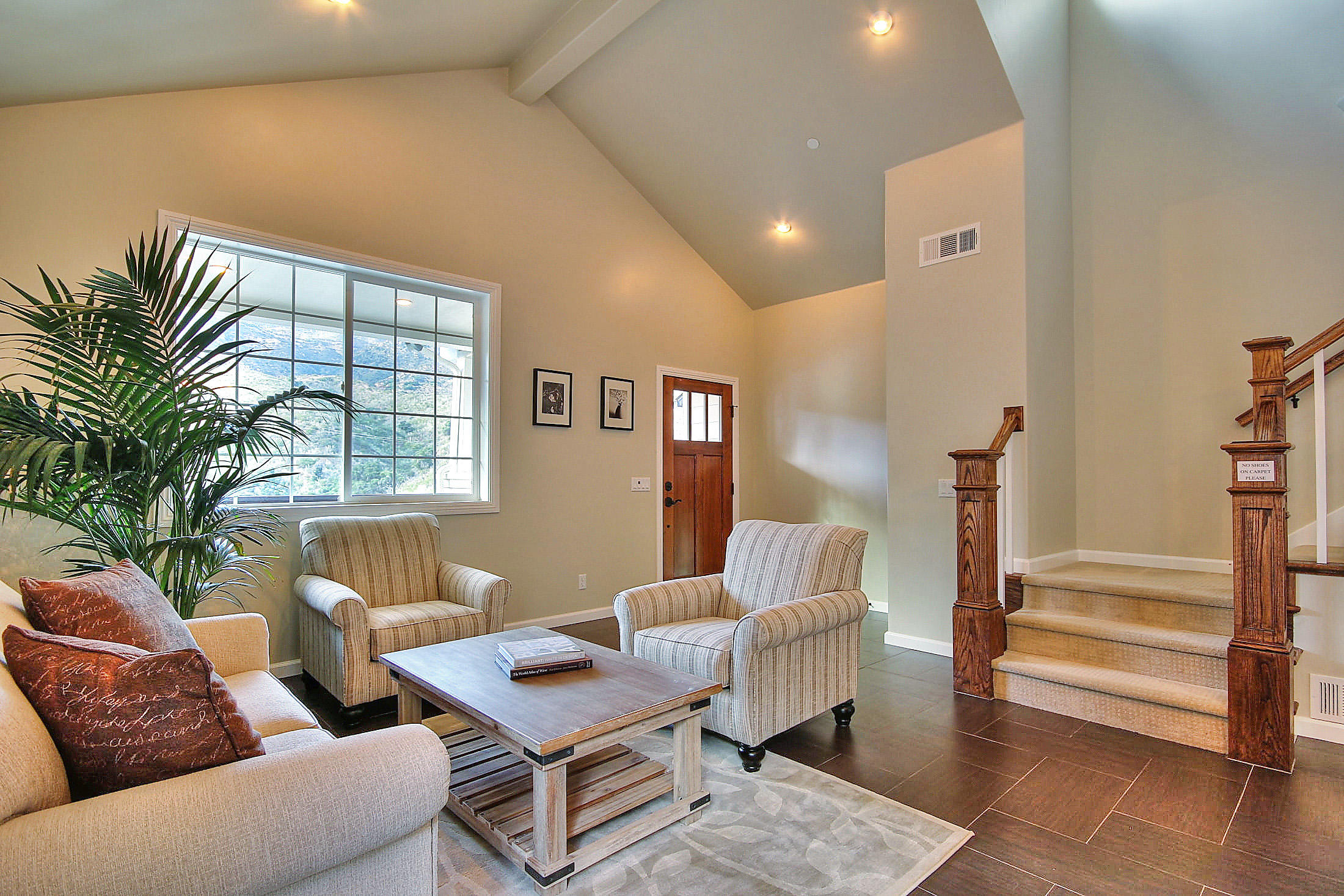 305 Sherman Road Santa Barbara, CA 93103 - Photo 4 of 23 a living room with furniture and a large window