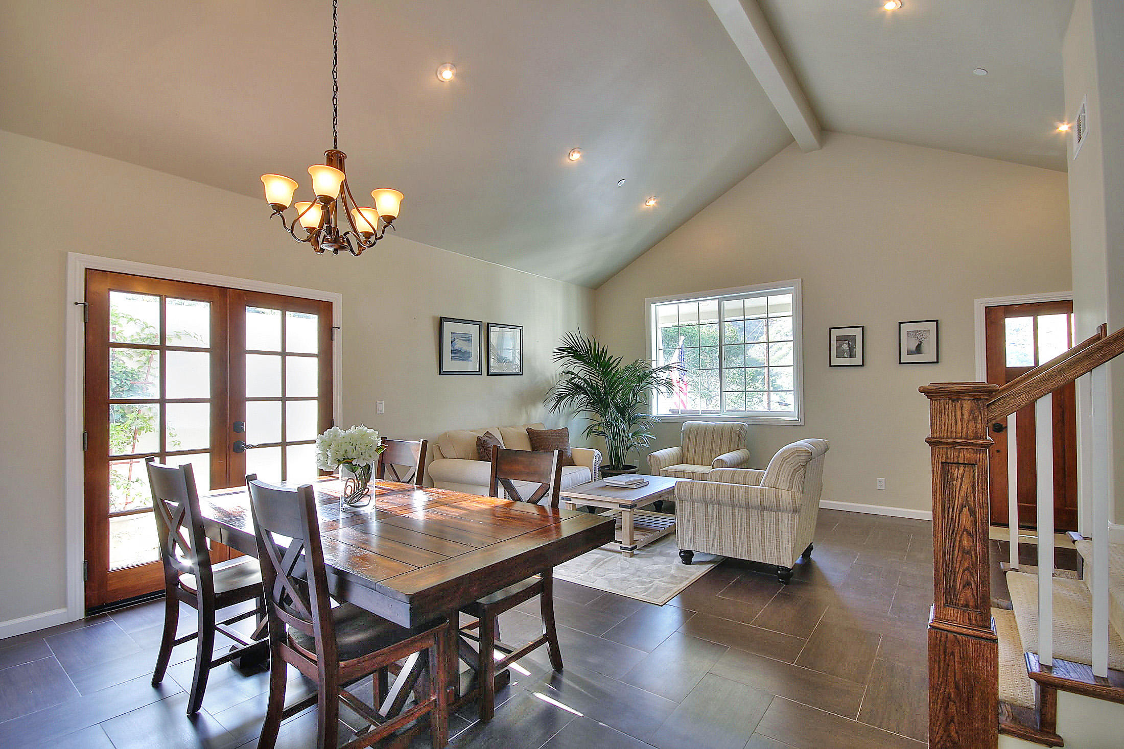 305 Sherman Road Santa Barbara, CA 93103 - Photo 5 of 23 a view of a dining room with furniture a chandelier and wooden floor