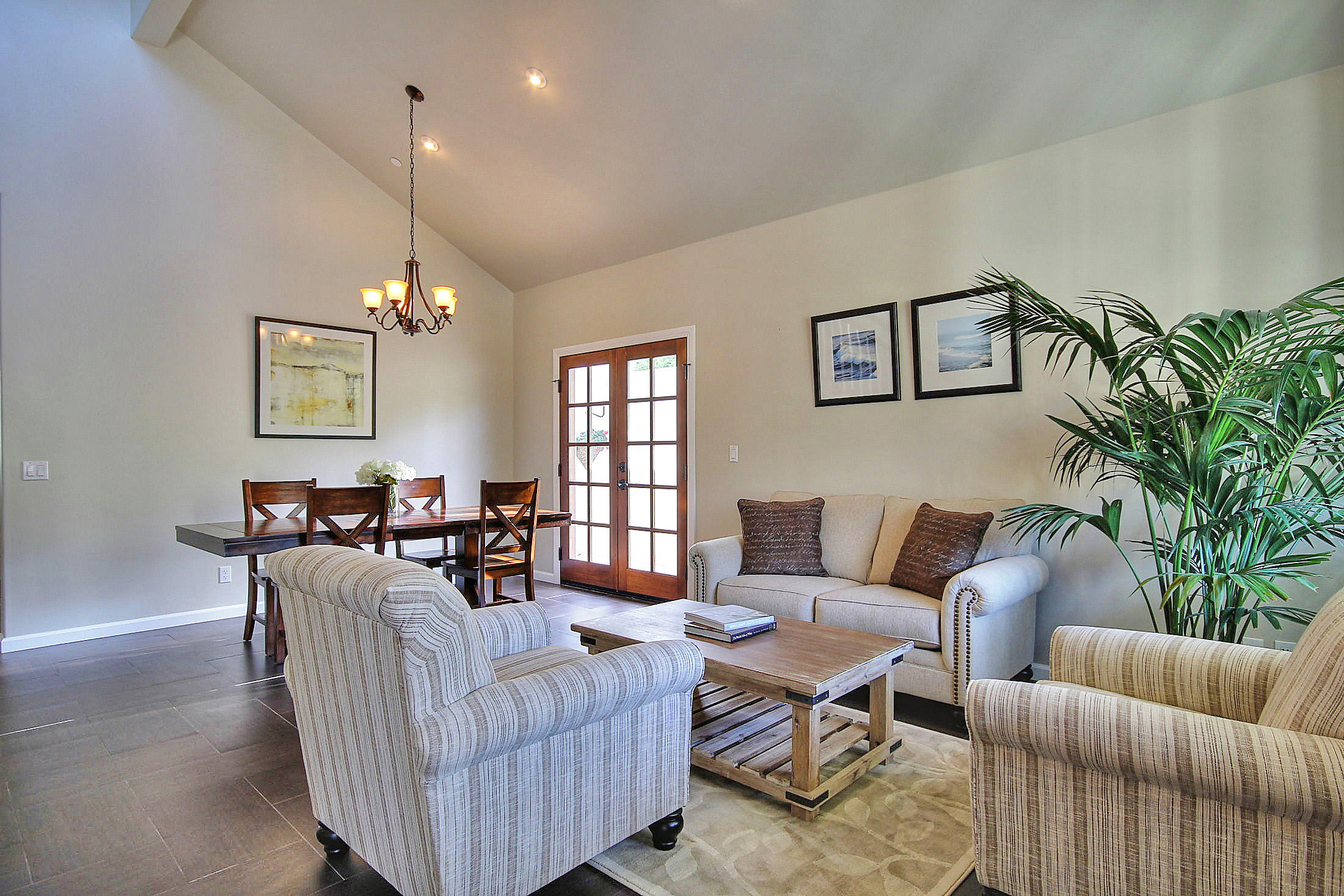 305 Sherman Road Santa Barbara, CA 93103 - Photo 6 of 23 a living room with furniture and a chandelier
