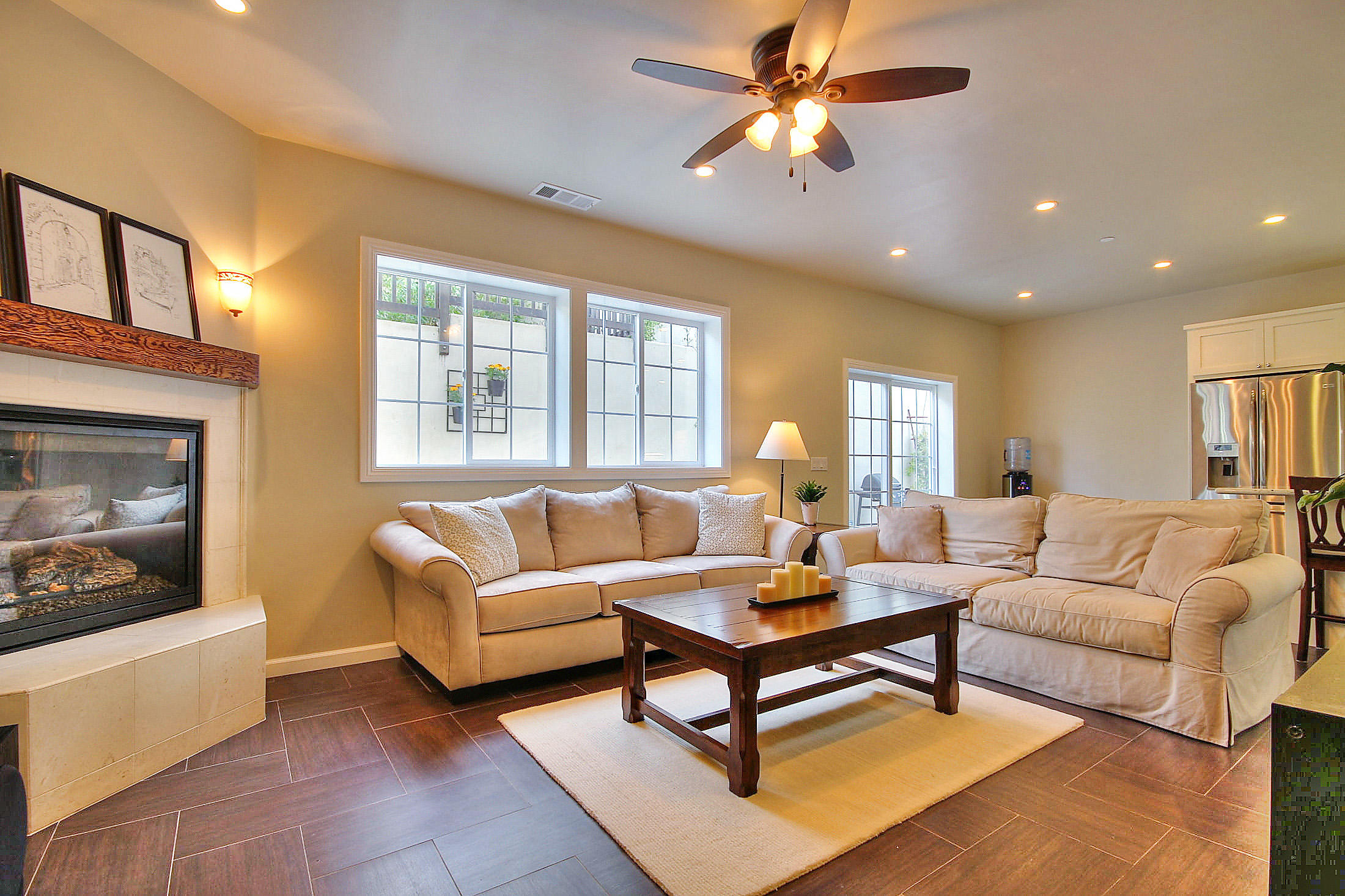 305 Sherman Road Santa Barbara, CA 93103 - Photo 10 of 23 a living room with furniture and a fireplace
