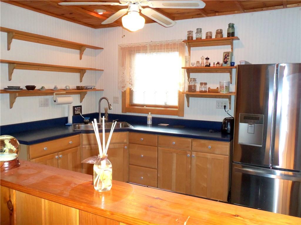 1680 Reissing Road McDonald, PA 15057 - Photo 12 of 39 a kitchen with stainless steel appliances wooden floor and a refrigerator