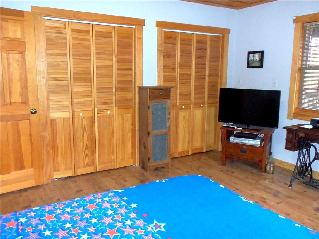 1680 Reissing Road McDonald, PA 15057 - Photo 15 of 39 a bedroom with a bed and flat screen tv