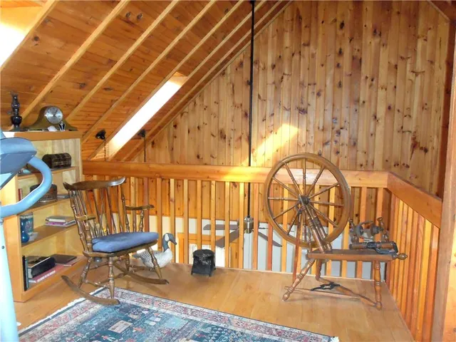 a view of a swimming pool with a lounge chair