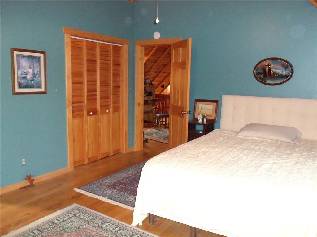 1680 Reissing Road McDonald, PA 15057 - Photo 24 of 39 a bedroom with a bed and a painting on the wall