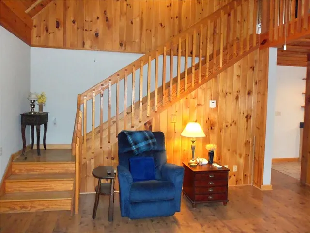 a view of entryway with wooden floor