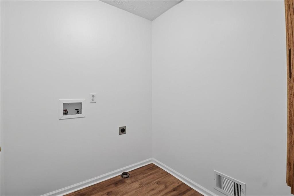 1828 4 Mile Church Road Ball Ground, GA 30107 - Photo 15 of 51 a view of a small space with wooden floor