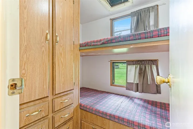 a view of a living room and entryway