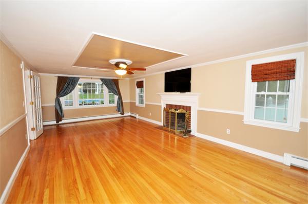 8 Bayberry Road Acton, MA 01720 - Photo 14 of 22 a view of living room with furniture and flat screen tv