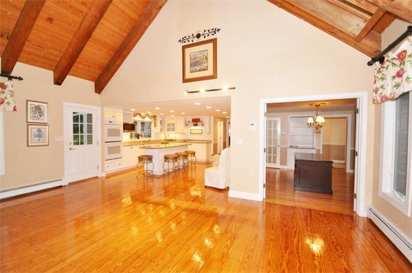 8 Bayberry Road Acton, MA 01720 - Photo 3 of 22 a view of a living room with furniture and floor to ceiling windows